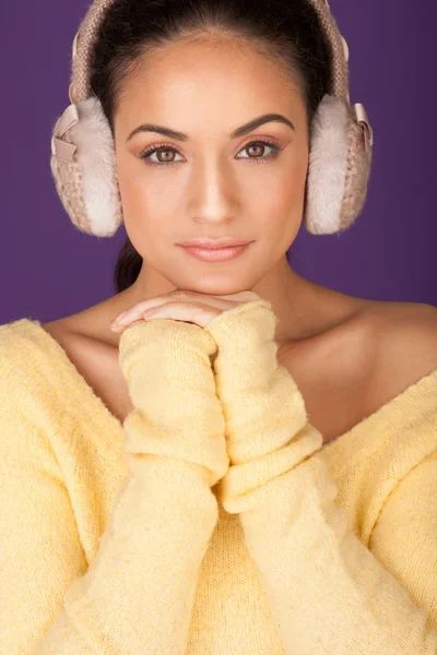 Stylish woman in winter ear muffs — Stock Photo, Image