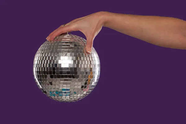 Női kezében egy disco ball — Stock Fotó