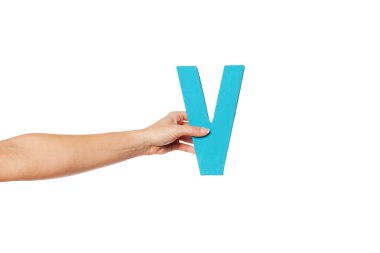 hand holding up the letter V from the left
