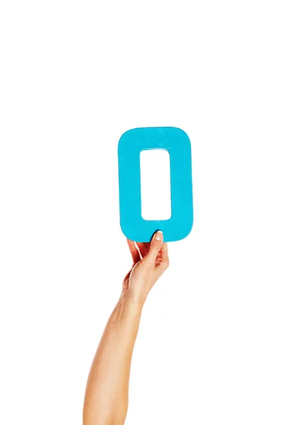 Hand holding up the number zero from the bottom — Stock Photo, Image