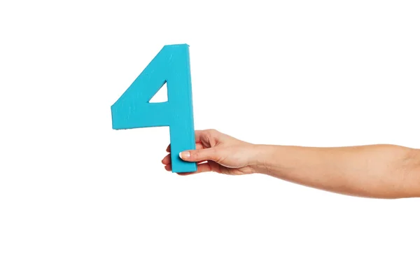 Hand holding up the number four from the right — Stock Photo, Image