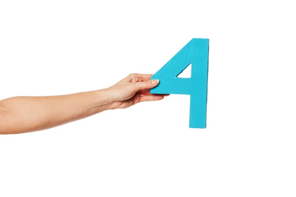 Hand holding up the number four from the left — Stock Photo, Image