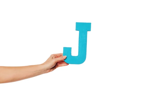 Hand holding up the letter J from the left — Stock Photo, Image