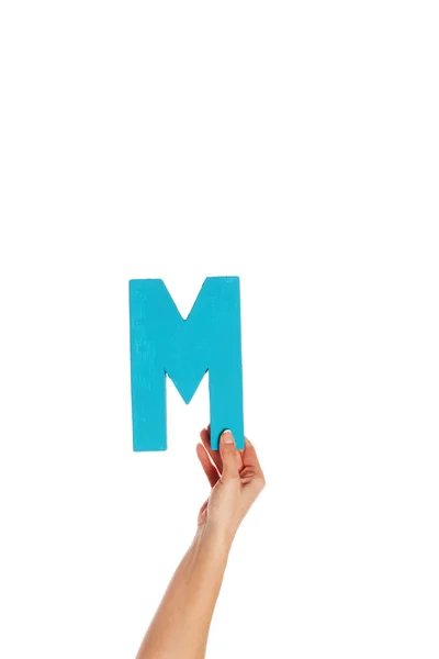 Hand holding up the letter M from the bottom — Stock Photo, Image