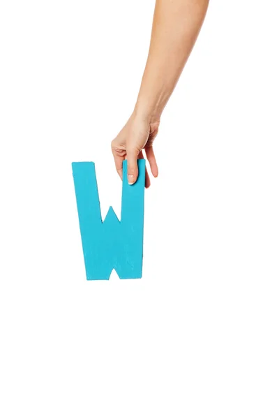 Hand holding up the letter from the top — Stock Photo, Image