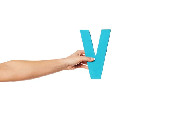 Hand holding up the letter V from the left — Stock Photo, Image