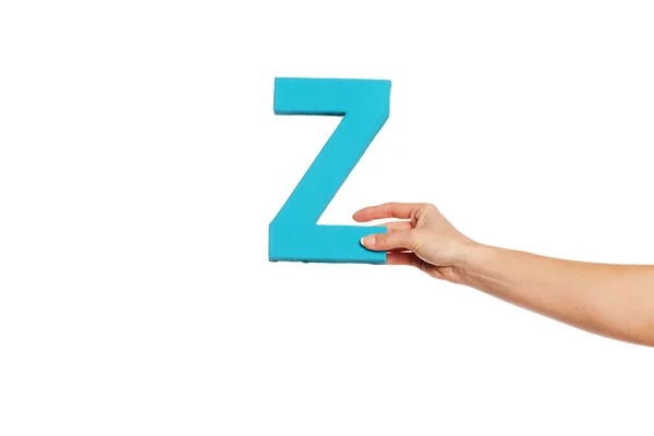 Hand holding up the letter Z from the right — Stock Photo, Image