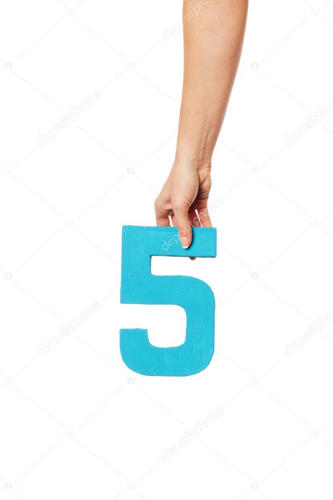 hand holding up the number five from the top
