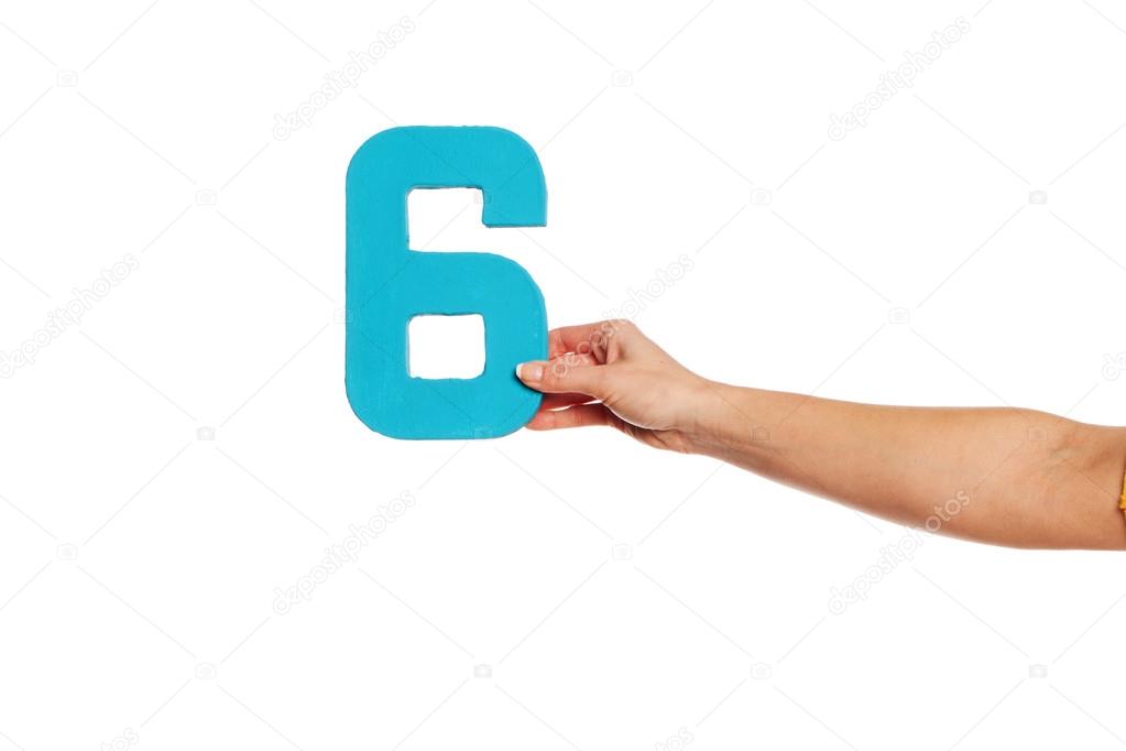 hand holding up the number six from the right