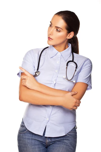 Attractive brunette doctor with stethoscope — Stock Photo, Image