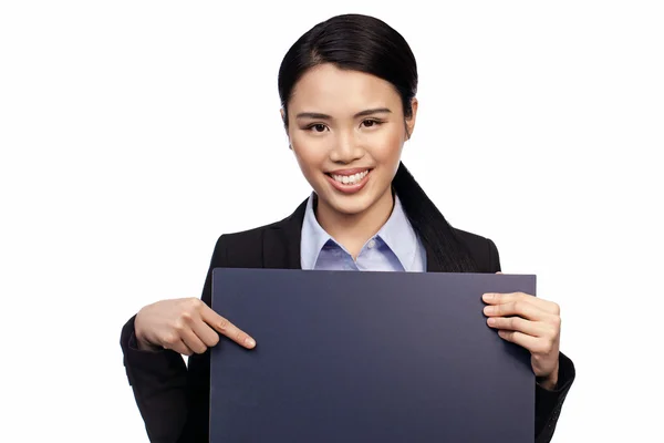 Smiling Asian lady with blank sign — Stock Photo, Image
