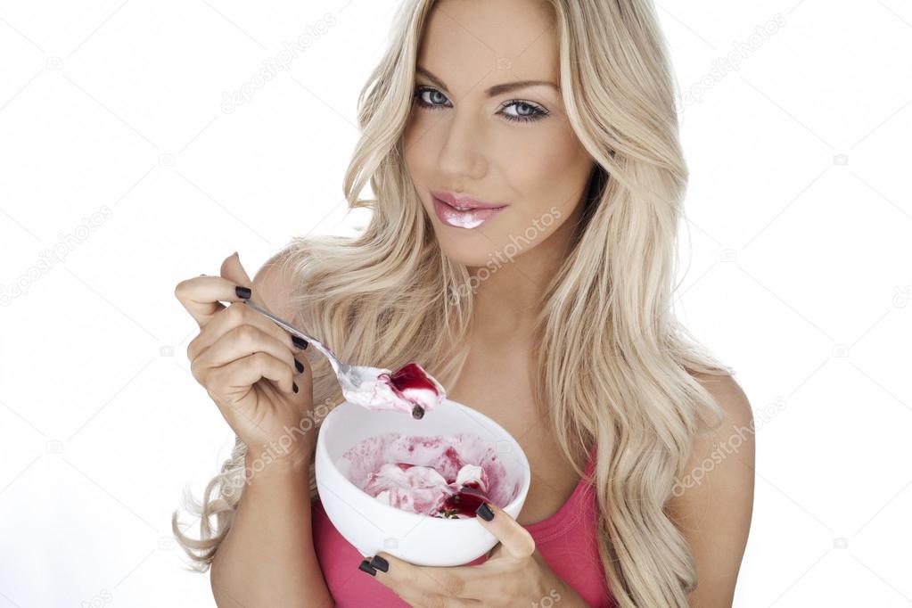 Beautiful woman enjoying dessert