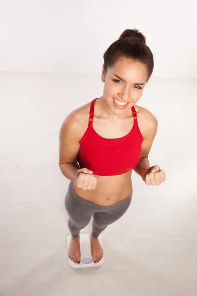 Woman overjoyed with her weight loss — Stock Photo, Image