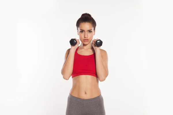 Adapter les jeunes femmes à l'exercice avec haltères — Photo