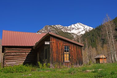 Old wood buildings in the Crystal Mill Ghost town clipart