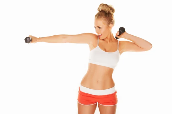 Mujer haciendo ejercicio con pesas — Foto de Stock