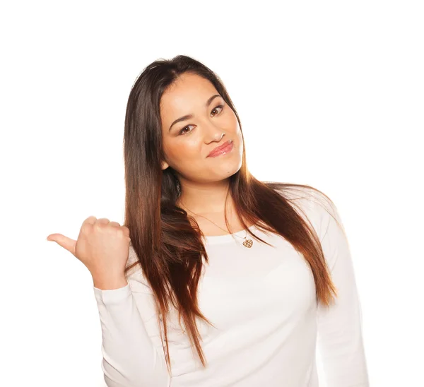 Mujer sonriente haciendo gestos con su pulgar —  Fotos de Stock