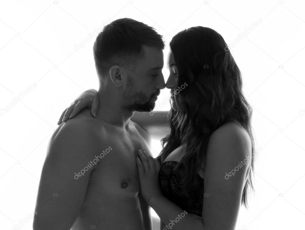 Sexy and romantic couple about to kiss