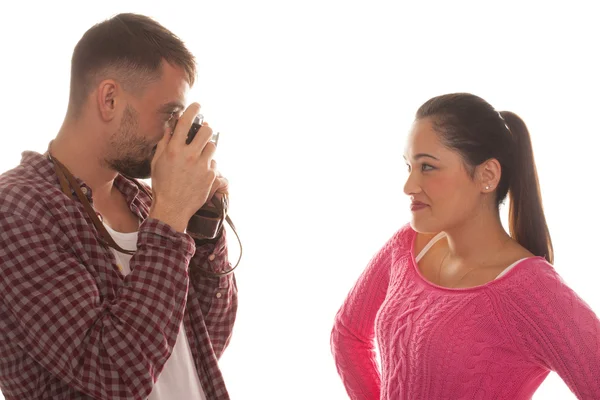 Young man photographing young woman — Stock Photo, Image