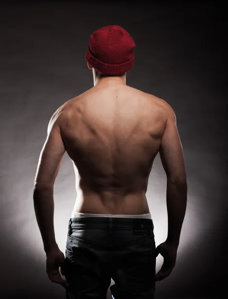 Espalda de un hombre joven en forma y musculoso — Foto de Stock
