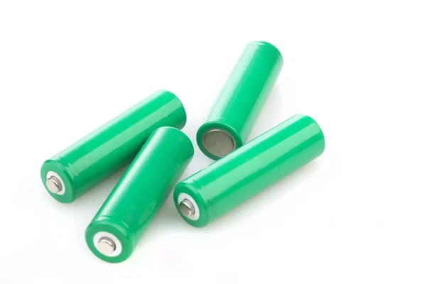 Four rechargeable green eco batteries — Stock Photo, Image