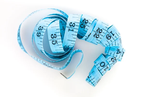 Blue measuring tape, shot from above, on white — Stock Photo, Image