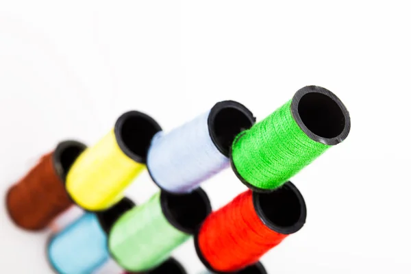 Pyramid of colourful cotton reels — Stock Photo, Image