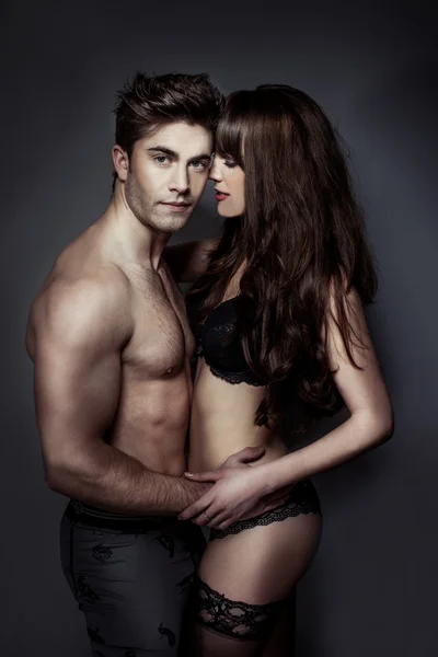 Erotic portrait of a sexy couple — Stock Photo, Image