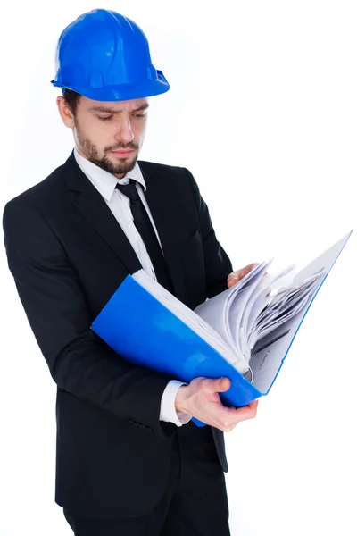 Architect consulting a binder of notes — Stock Photo, Image