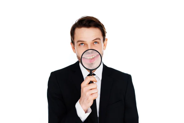 Businessman with a magnified smile — Stock Photo, Image