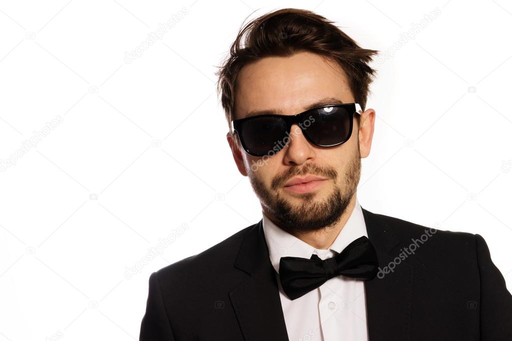 Cool macho businessman in sunglasses