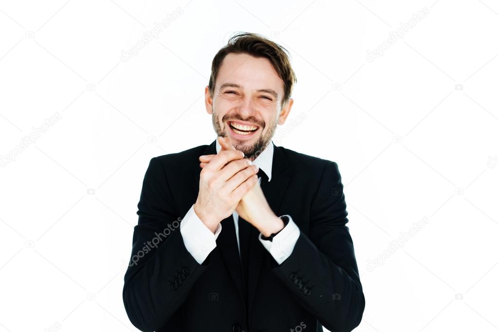 Happy businessman laughing