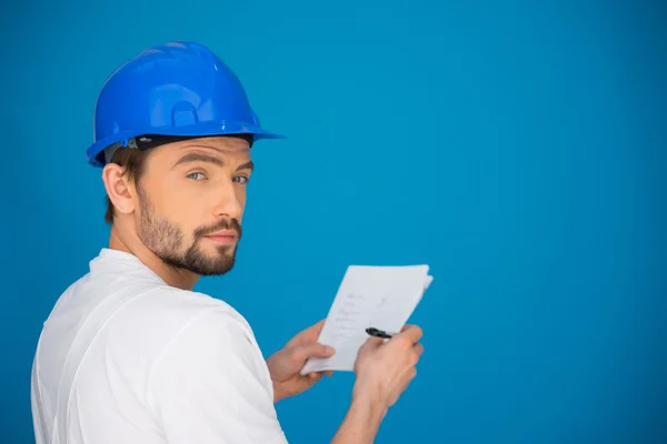 Artisan or workman taking notes — Stock Photo, Image