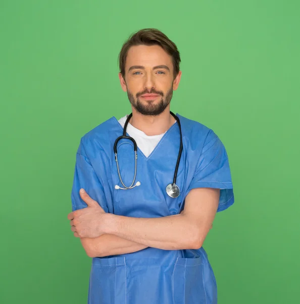 Confident friendly young male doctor or nurse — Stock Photo, Image