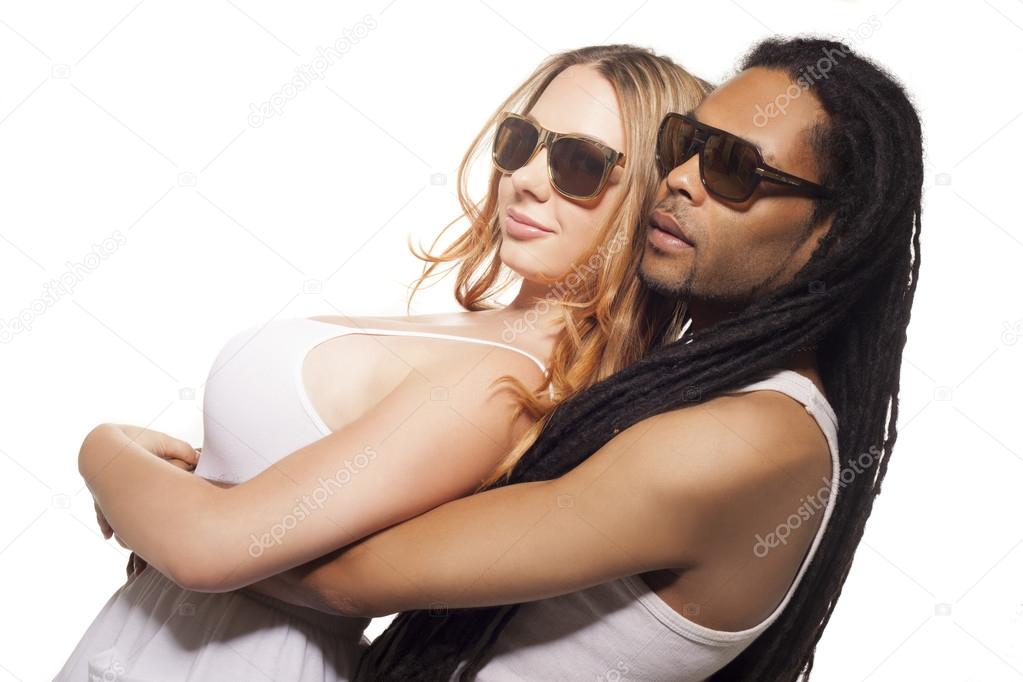 Woman hugged from behind by man