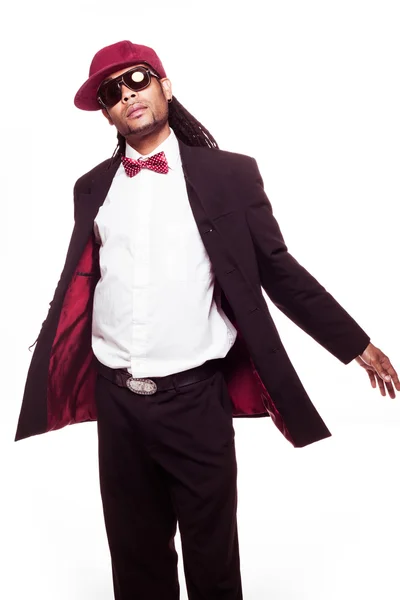 Jamaican man wearing suit and sunglasses and bow — Stock Photo, Image