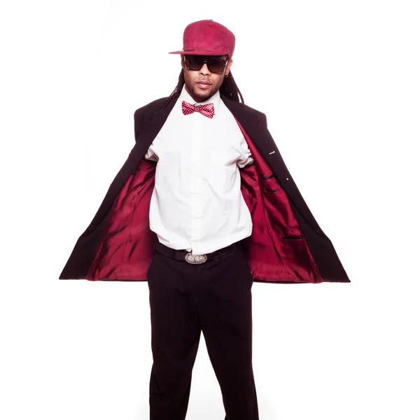 Jamaican man wearing suit and sunglasses and bow — Stock Photo, Image