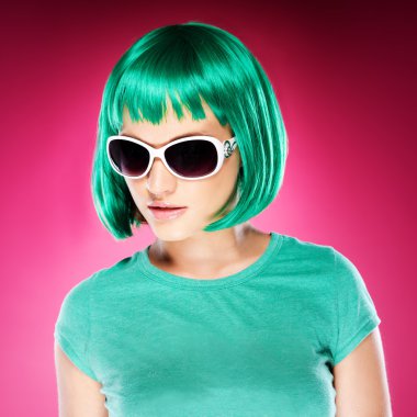 Trendy beautiful young woman in sunglasses clipart