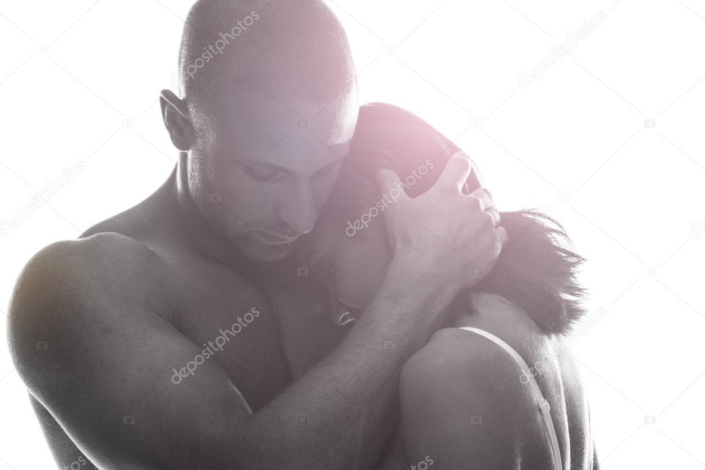Couple in love holding each other close