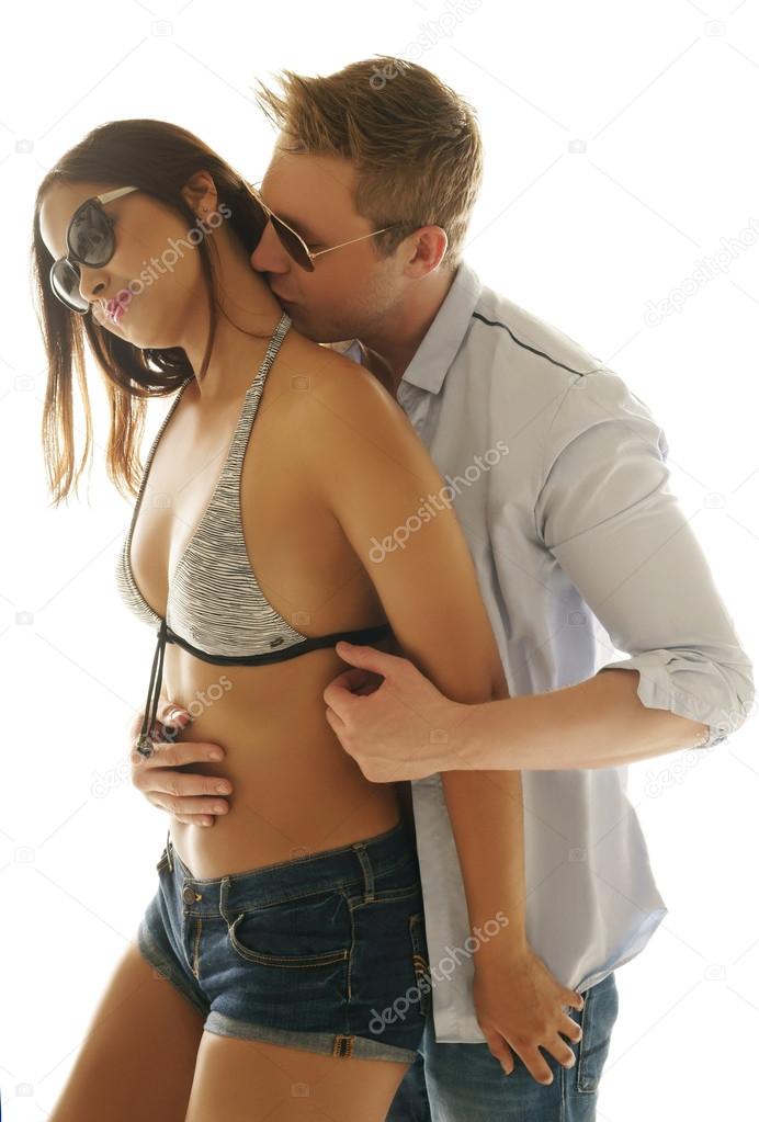 Loving young man kissing his girlfriend