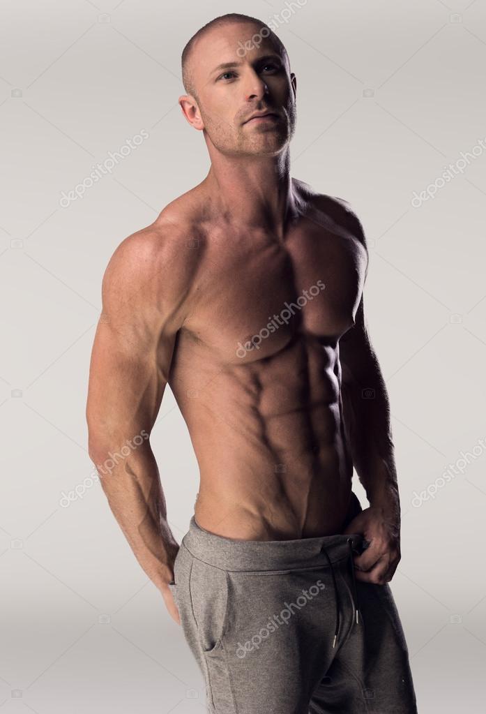 Handsome and muscular male model with a chiseled physique Stock