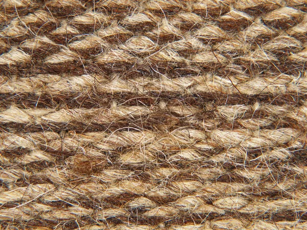 Tricot rugueux motif de texture de tissu de laine de chameau . — Photo