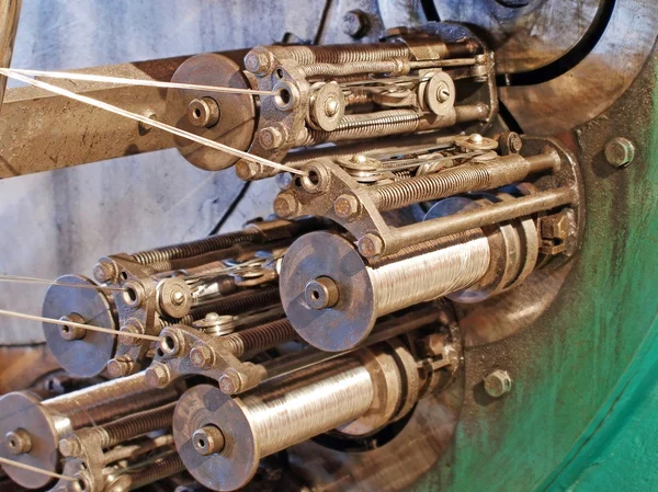 Detail of braiding machine taken closeup.Flexible metal hose pro — Stock Photo, Image