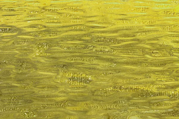 Goldene Wellen abstrakte Textur. — Stockfoto