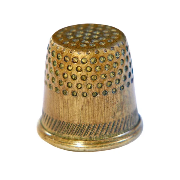 Old bronze sewing thimble isolated on white background. — Stock Photo, Image