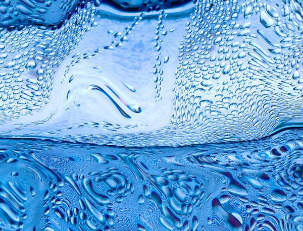 Gocce d'acqua blu stilizzate prese primo piano come sfondo astratto . — Foto Stock