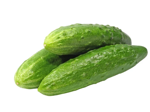 Three fresh green cucumbers taken closeup.Isolated. — Stock Photo, Image