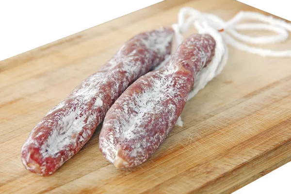 Reife Luftgetrocknete Wurst Spanische Traditionelle Wurst Fuet Auf Holzbrett Großaufnahme — Stockfoto