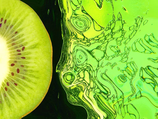 Half Ripe Green Kiwi Slice Green Abstract Liquid Background — Photo