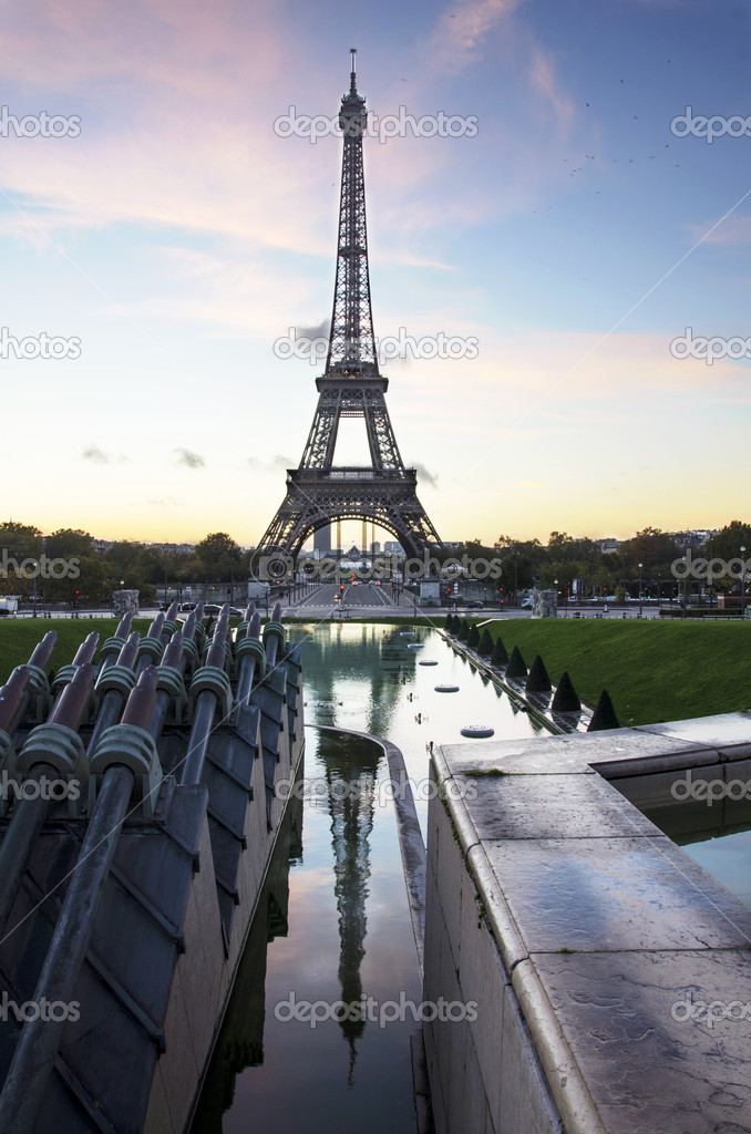 Eiffel Tower at dawn with reflection seen from Trocadero. Paris landmark. France.